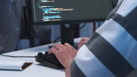 Close-up shot of IT freelancer's hand typing software code for application. Stock Footage 319515111