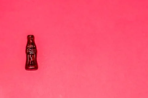A close-up shot of a jelly candy in a shape of a glass bottle of cola with th Stock Photos