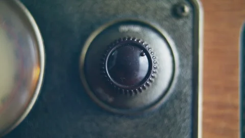 Close up shot of knob turning for changing volume on a vintage radio Stock Footage 273120881