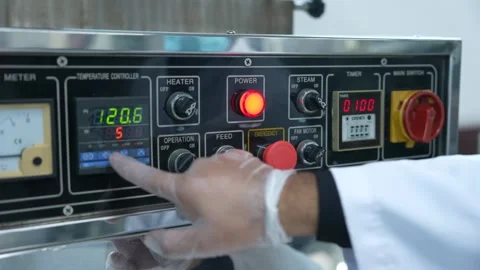 Close Up Shot Of A Lab Technician Operating The Control Panel Of A Machine Used Stock Footage 335912238