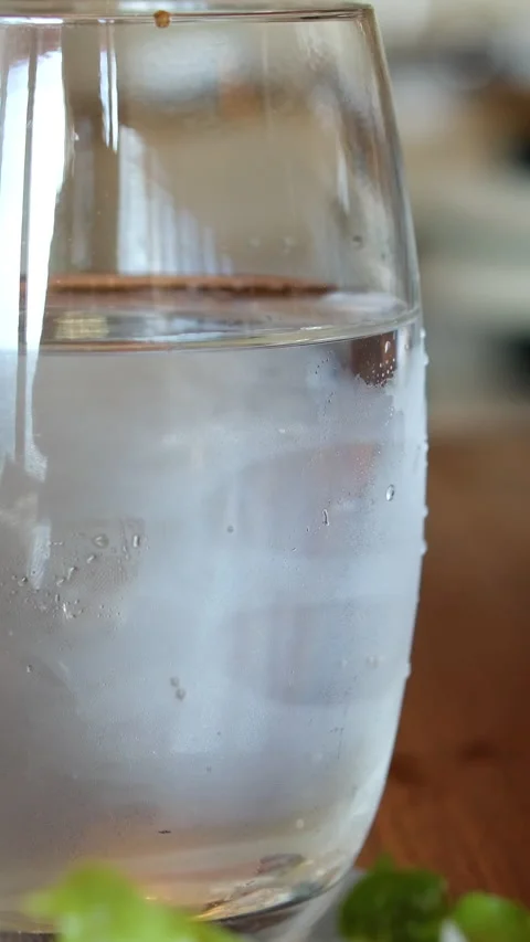 Close up shot of laptop with code on screen, glass and bottle of water, notebook Stock-Footage 314343909