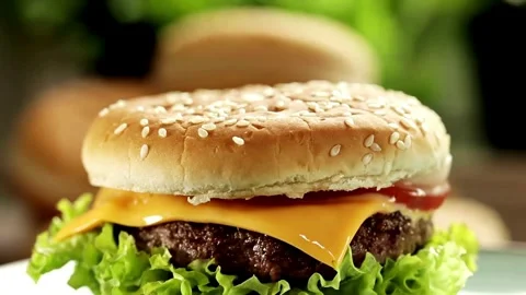 Close up shot of large tasty burger with beef steak, rotate on turntable burger Stock Footage 336579273
