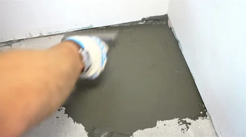 Close up shot of laying tile on the floor 動画素材 65287864