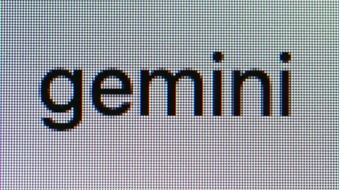 A close-up shot of the letters 'gemini' being typed into a search bar Stock Footage 335691036