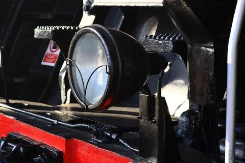 A close-up shot of a light on a train, suitable for use in travel or Stockfoto's