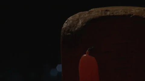 Close up shot of lighting a candle with a lighter Stock Footage 67884184