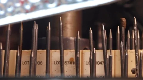 Close-up shot A lot of dremel bits at jeweler's workplace Stockbeeldmateriaal 71400255