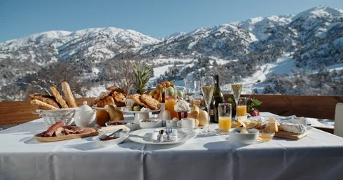 Close up shot of a luxurious breakfast with various fruits, snacks and champagne Stock Footage 124379328