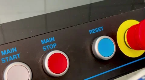 A close-up shot of a machine control panel displaying an array of push buttons Stock Footage 316839807