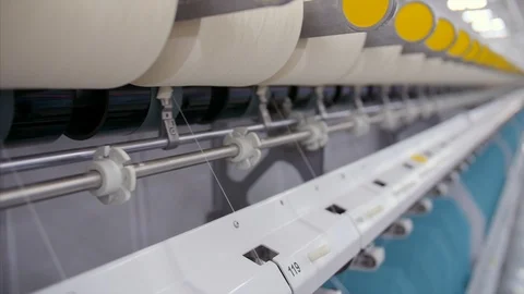 Close shot of machines at work in a textile factory Stock Footage 115404163