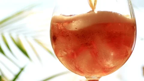 Close up shot of making iced coffee with sweet rose sparkling wine Stock Footage 91732734