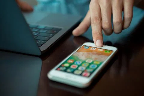 Close-up shot of male code developer hands typing, working behind office table Foto stock