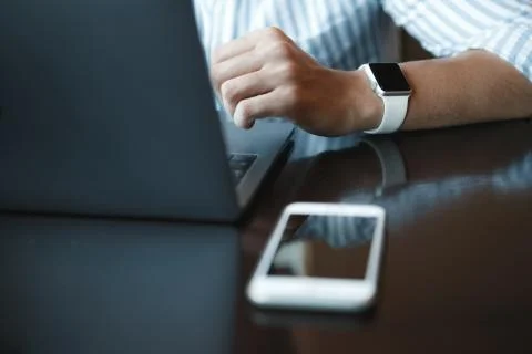 Close-up shot of male code developer hands typing, working behind office table 스톡 사진