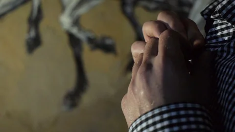 Close-up shot of a man buttoning a shirt Stock Footage 70866239