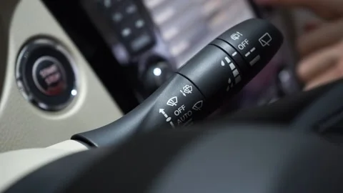 Close up shot of man checking wiper operation in the car. Video stock 169030056