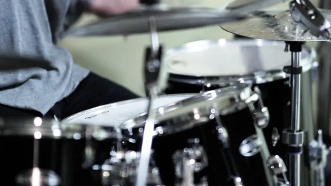 Close shot of man drummer hands playing music. Dumset is beautiful instrument  Stock Footage 104855186