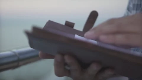Close up shot of man hand flicking through daily planner notebook journal diary  Stock Footage 132675574