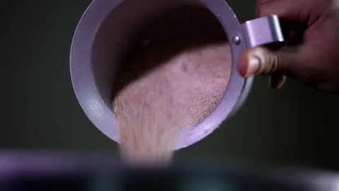 Close up shot of a man hand putting carefully a small amount of brown sugar from 動画素材 137541707