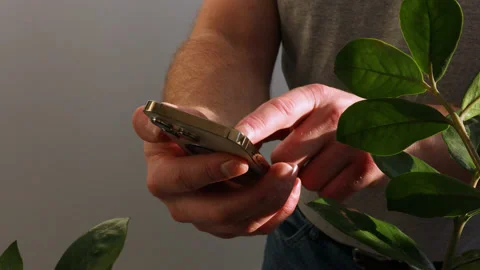 Close up shot of man hands using smart phone for check email for work or sending Stock Footage 229408355