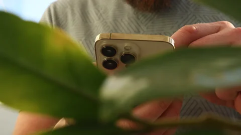 Close up shot of man hands using smart phone for check email for work or sending Stock Footage 229408450