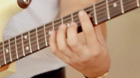 Close up shot man playing guitar Stock Footage 66441961