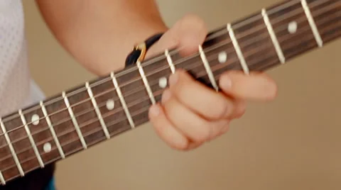 Close up shot man playing guitar Stock Footage 66442094