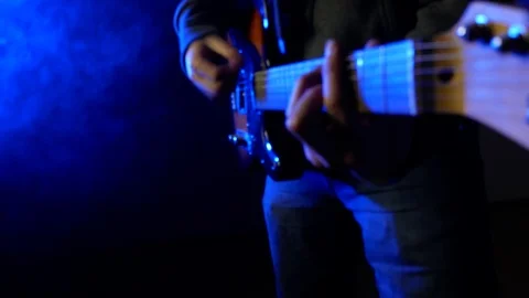 This is a close up shot of a man playing a guitar Stock Footage 71083644