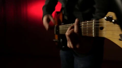 This is a close up shot of a man playing a guitar Stock Footage 71083862