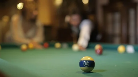 Close-up shot of a man playing pool billiard Stock Footage 129179179