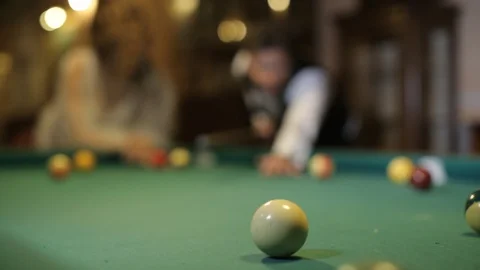 Close-up shot of a man playing pool billiard Stock Footage 129179232