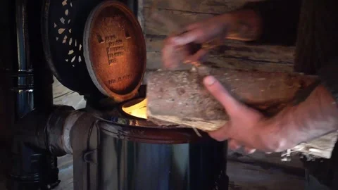 Close Up Shot Of A Man Setting Fire To Wood A Fireplace Stock Footage 286896464