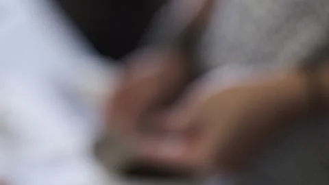 Close up Shot of man sorting out pepper in a ceramic bowl Stock Footage 146250236