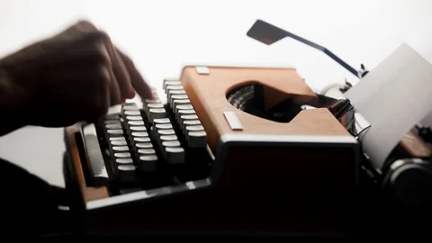 Close up shot of man typing on old vintage retro typewriter. News, media concept Stock Footage 124144860