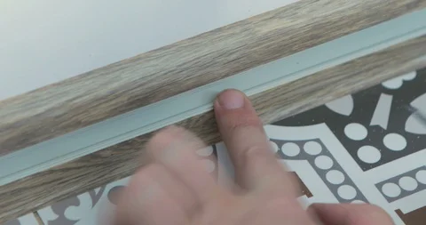 Close up shot of a man using an electric hand drill Stock Footage 105427771