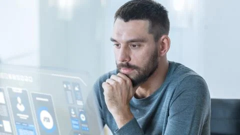 Close up Shot of a Man Using in His High-Tech Computer with Transparent Display Stock Photos
