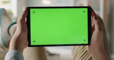 Close up shot of man using a laptop computer, watching a video. Green screen Stock-Footage 139937357