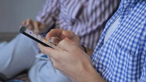 Close up shot of a man using mobile smart phone. Checking email Stock Footage 128547923