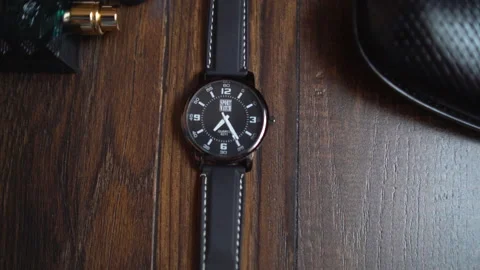 Close shot of man's accessories. Black watch, perfumes and shoes. Small details Stock Footage 148735909