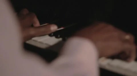 A close up shot of a man’s hands playing jazz piano Stock Footage 59110963