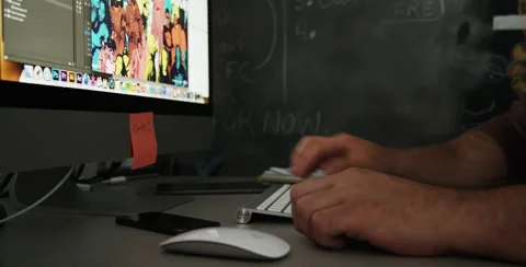 Close up shot of man's hands putting down computer and using tablet Stock Footage 49938771