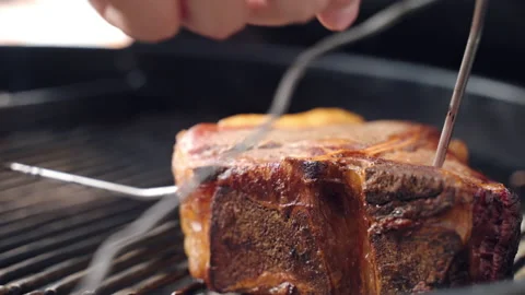 Close up shot of medium rare meat steak grilling on fire, premium beef steak Stock-Footage 221980684