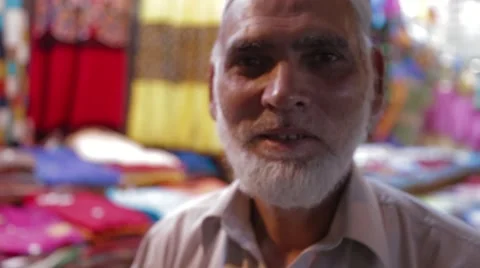 Close up shot of a merchant in Souk Mutrah Stock Footage 45842394