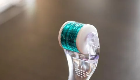 Close up shot of the micro needle skin care derma roller. Self care Stock Photos