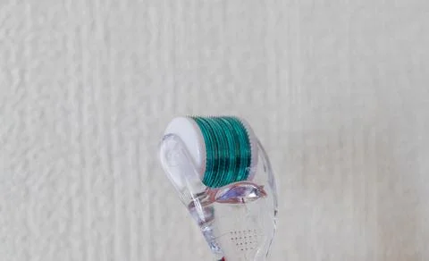 Close up shot of the micro needle skin care derma roller. Self care Stock Photos