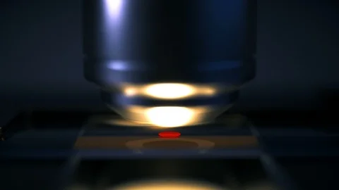 Close-up shot of microscope inspecting blood drop Stock Footage 114647174