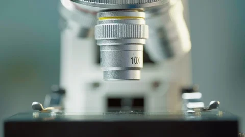Close Shot Microscope Lenses Conducting Research In Medical Laboratory Stock Footage 127212916