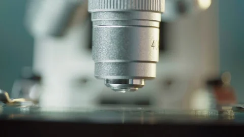 Close Shot Microscope Lenses Conducting Research In Medical Laboratory Video stock 127213849