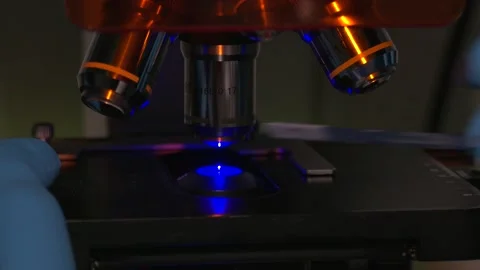 Close-up shot of microscope with metal lens at laboratory Video stock 126747927