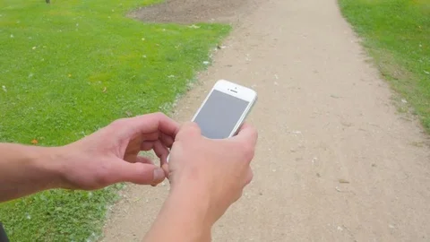 Close up shot of mobile phone in the man hands Video stock 84003964