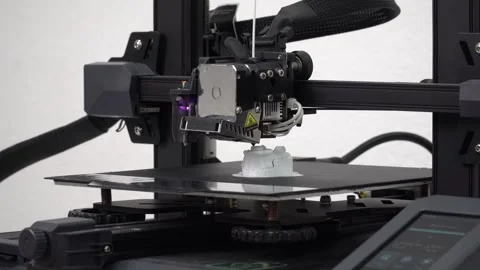 Close-Up Shot of a Modern 3D Printer Finishing Manufacturing a White 3D Model 库存影片 252354135